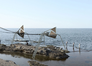 Illustration for article titled These Eerie Kinetic Sculptures by the Sea Would Also Make Electricity